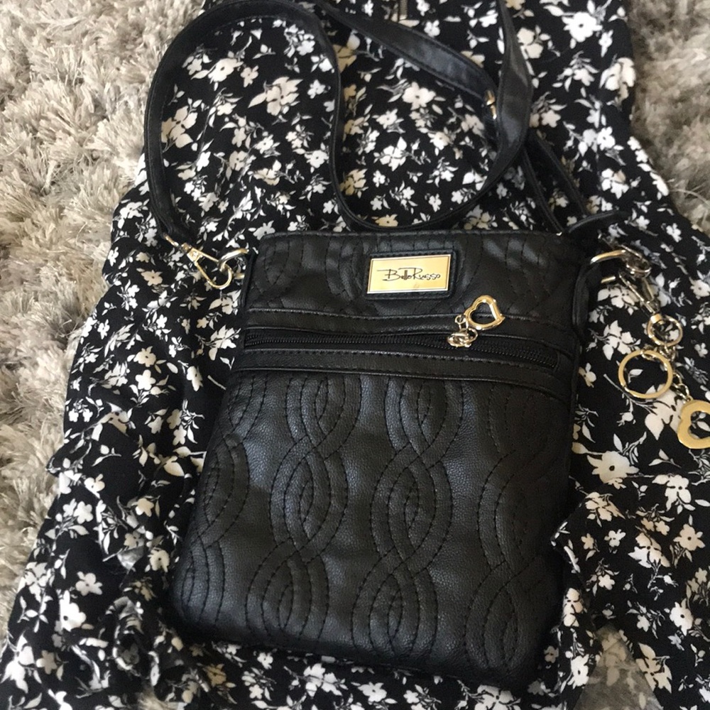 Belle Russo crossbody bag with adjustable strap.
